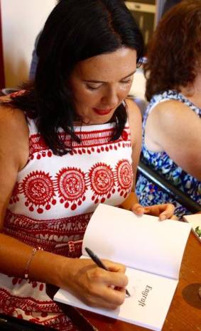 Michele Seminara signing copies of Engraft at the launch. Photograph Naida Entwistle.