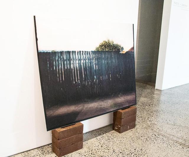 Talia Smith, Seven Times over Seven Days (Time, Distance, Me and You), inkjet print on matte paper from a 120mm photograph, bricks, plywood, 2016. Picture courtesy of Interlude Gallery