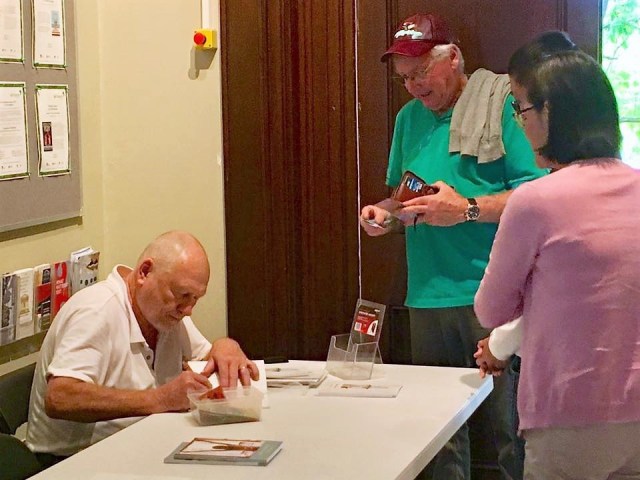 !ENHANCED Launch Will Tibben signing copies of suburn veneer at the launch 22 April 2017 NSW Writers' Centre